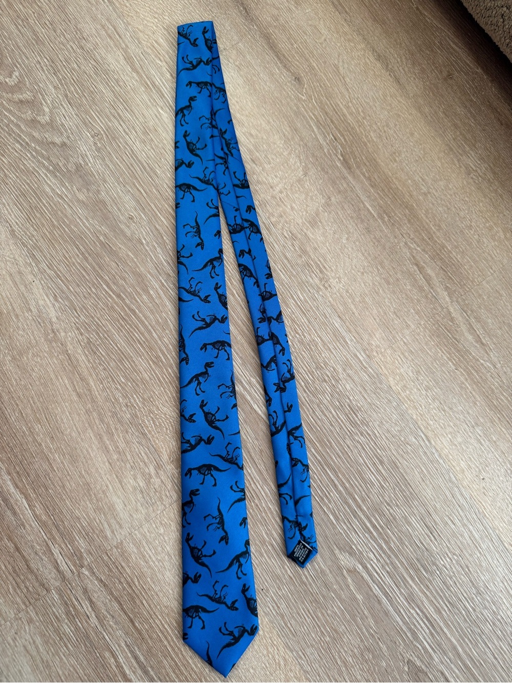 Wembley Blue Tie with Black Dinosaur Print